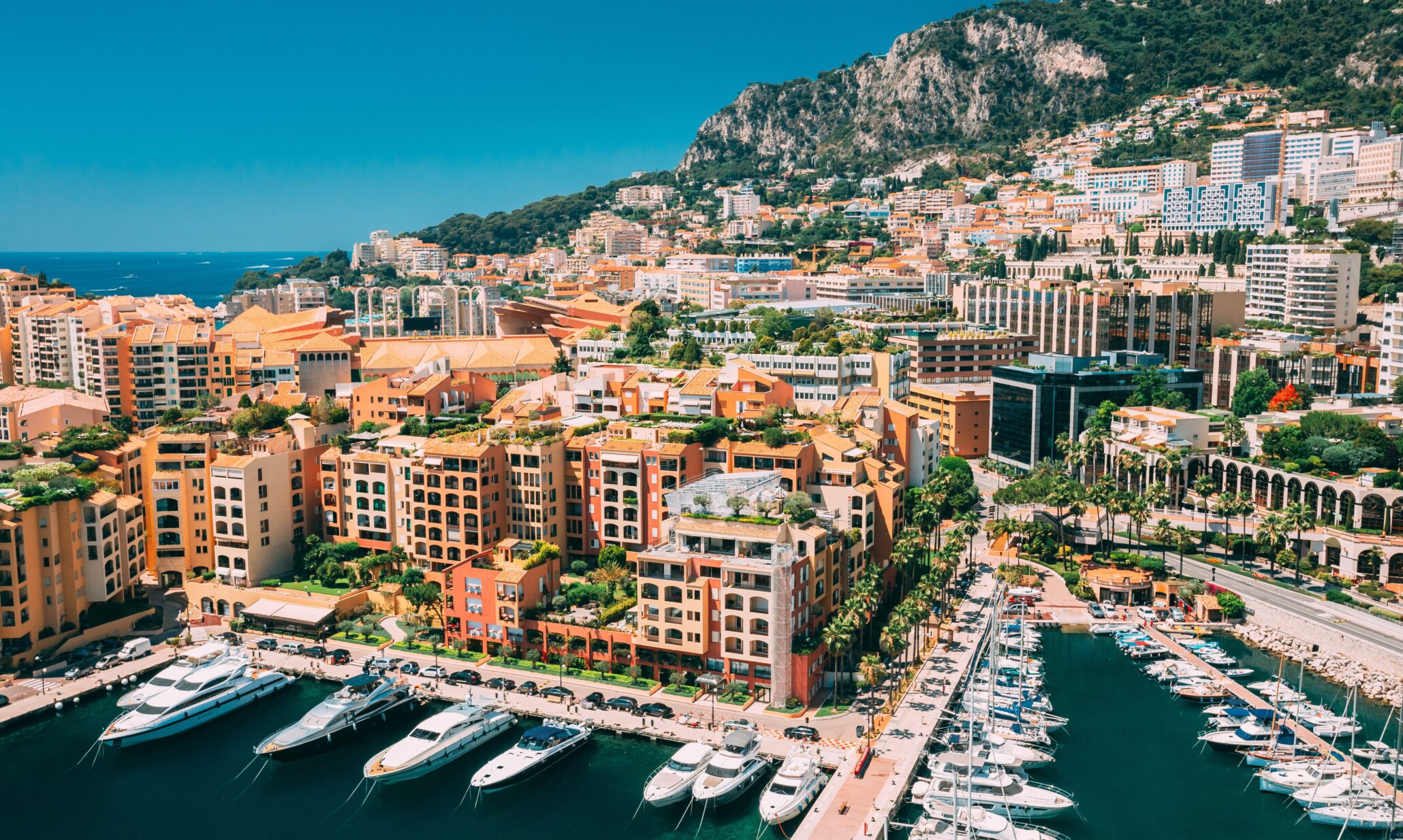Port in Monaco with yachts and buildings